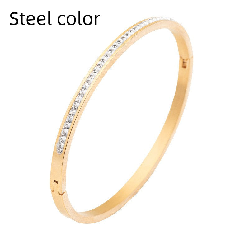 Dazzling Single Row Stainless Steel Bracelet With CZ Diamond.